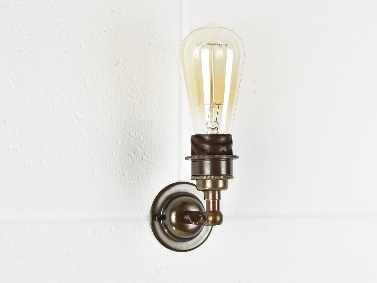 Bare bulb online wall light